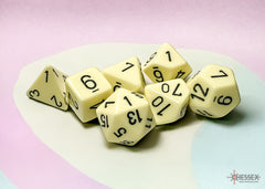 CHESSEX OPAQUE DICE: PASTEL YELLOW & BLACK | Gamers Paradise