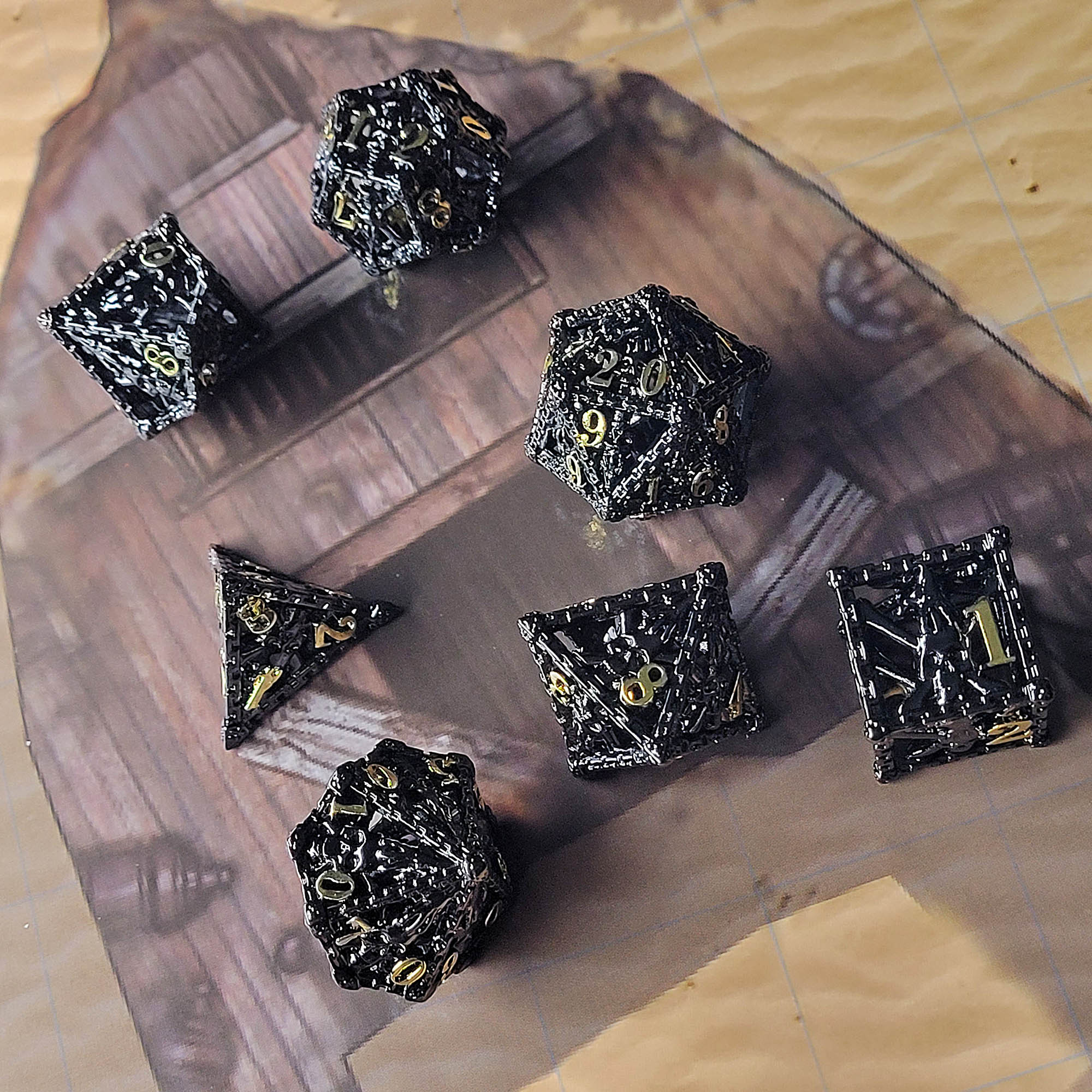 7th Circle Black and Gold Hollow Metal RPG Dice Set | Gamers Paradise