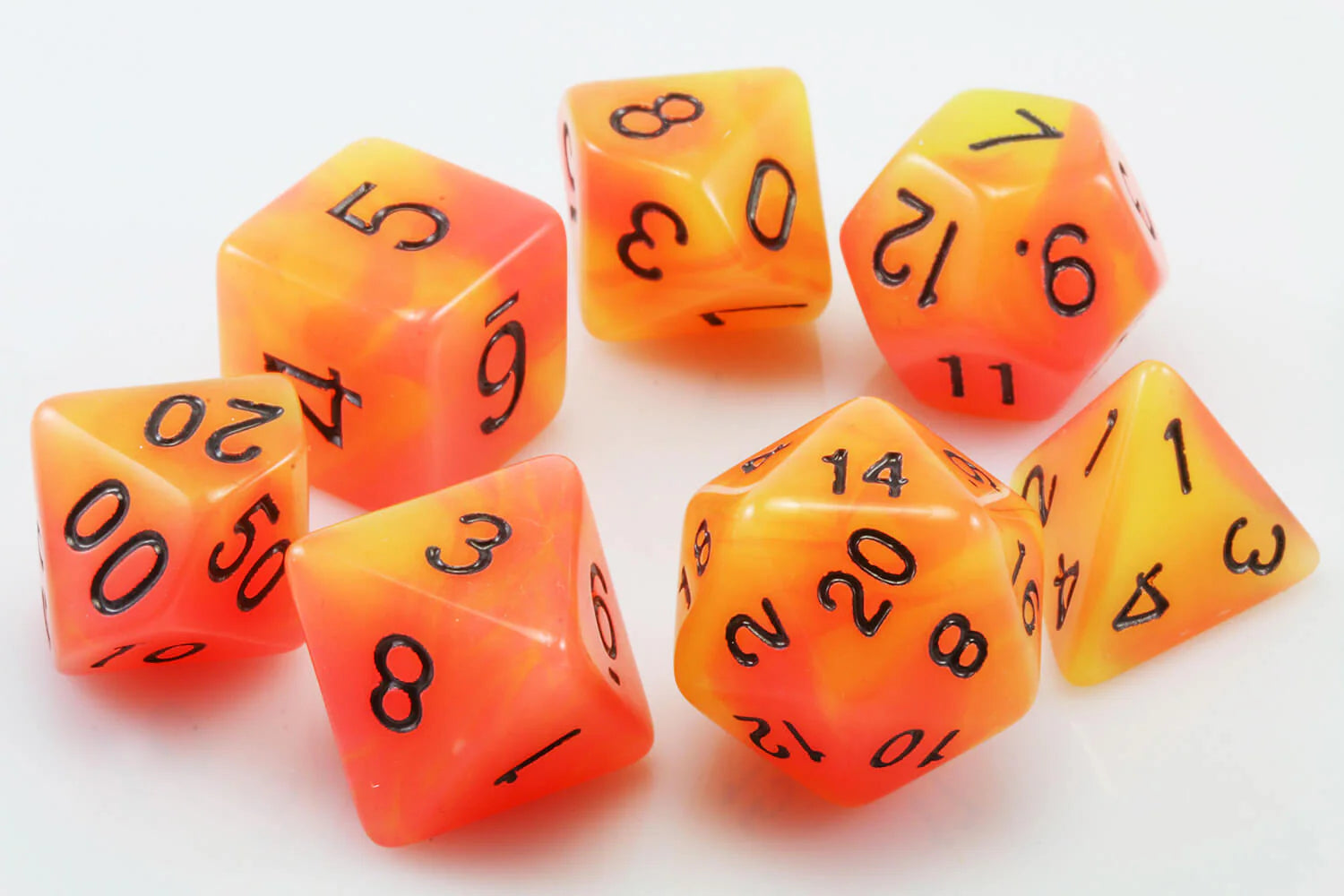 Orange Set of 7 Glow in the Dark Polyhedral Dice with Black Numbers for D20 based RPG's | Gamers Paradise